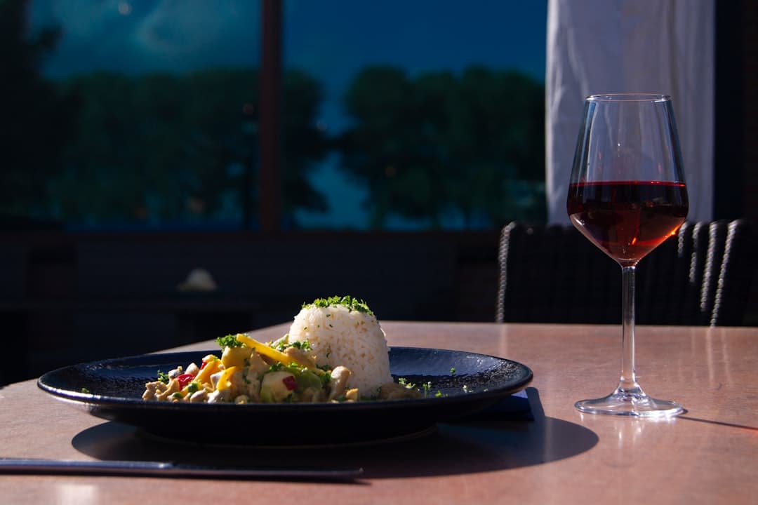 Red wine alongside an elegant seafood dish